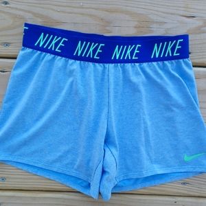 Nike shorts in light blue and green